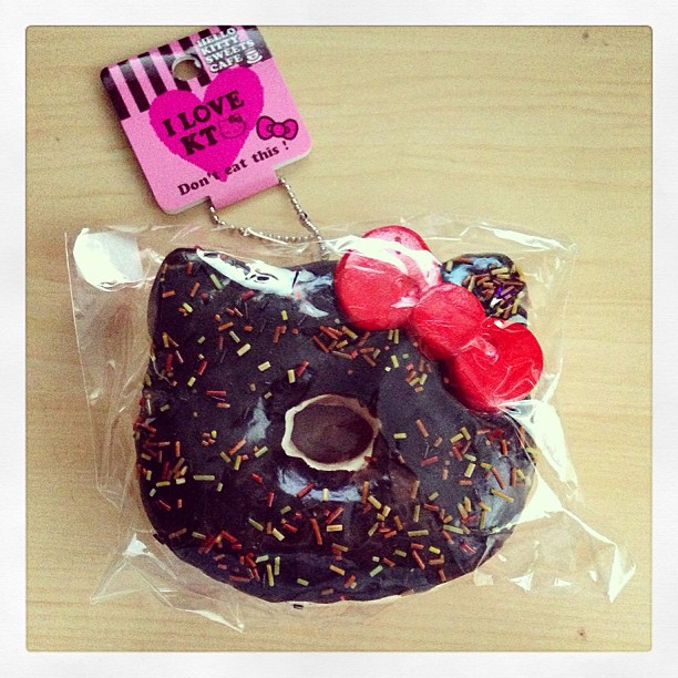 I'm still not quite sure what possessed me to buy this squishy styrofoam chocolate Hello Kitty Donut keychain.  It's the size of a real donut too! Hmm... 