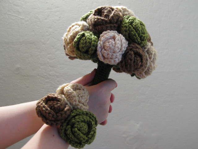 Crocheted rose bouquet and wrist corsage in green, brown, cream, and sand colors