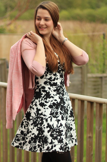 OOTD, outfit of the day, pink boucle blazer, pink cardigan, monochrome floral dress, black tights, studded boots