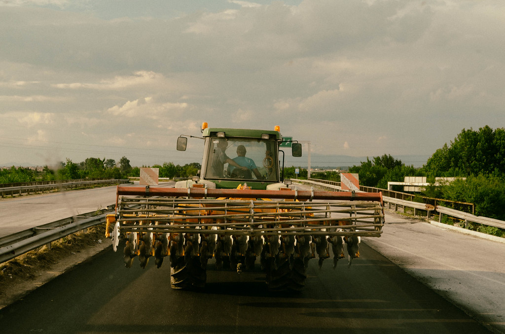 A tractor on the main road in Bulgaria