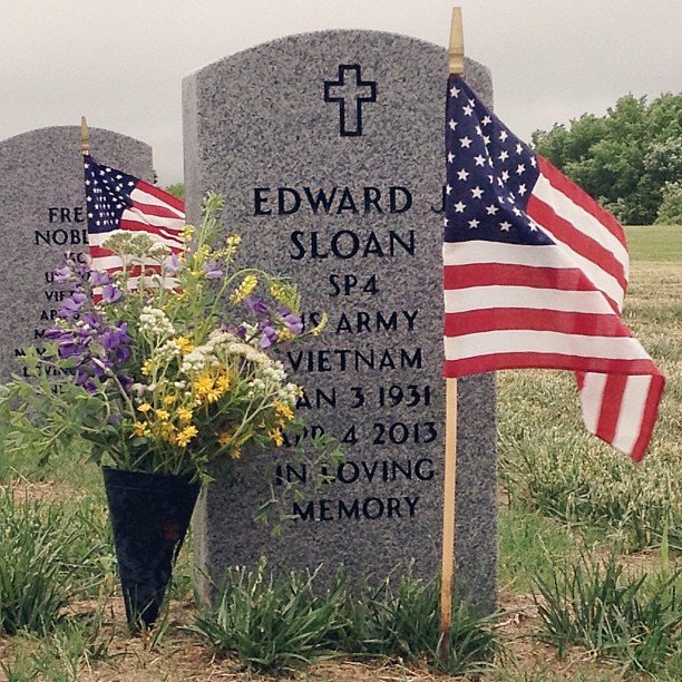 The kids and I picked wildflowers for my uncle's grave. The Veterans Cemetery is a beautiful and somber place today. Thanks to all who serve. #memorialday
