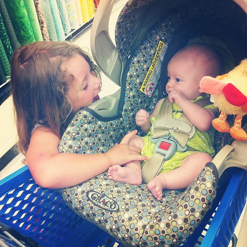 Cousin love in the fabric store.