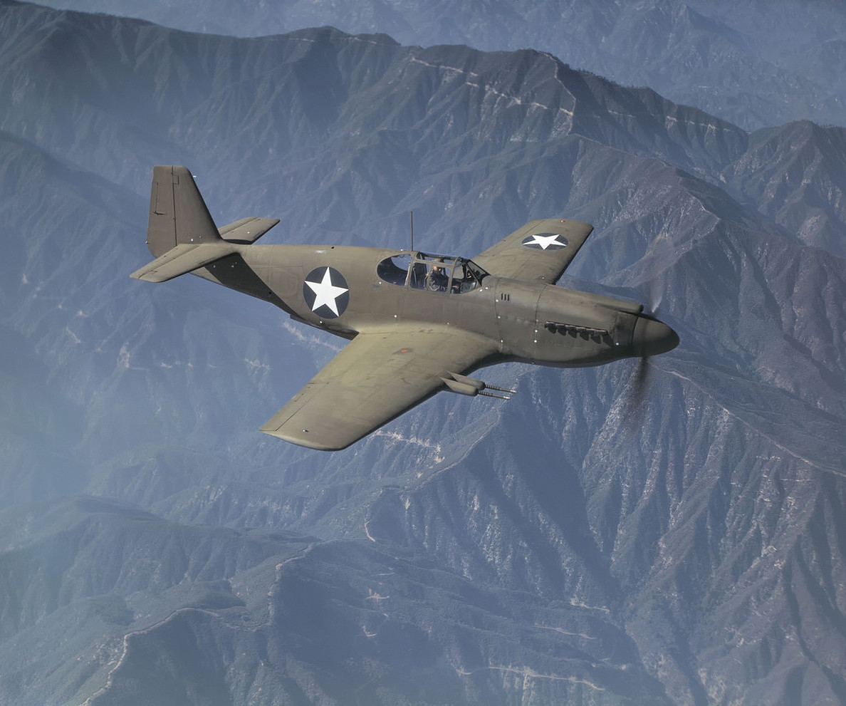 A North American Mustang Mk. IA on a test flight from NAA's Inglewood, California facility in October 1942. The painted-over serial number appears to be 41-37416. According to Warbird-Central.com it was damaged during shipment to Europe in late 1943.