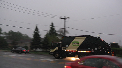 Enroute to a trash collection on a rainy morning.  Niles Illinois USA.  Monday, May 7th 2012. by Eddie from Chicago
