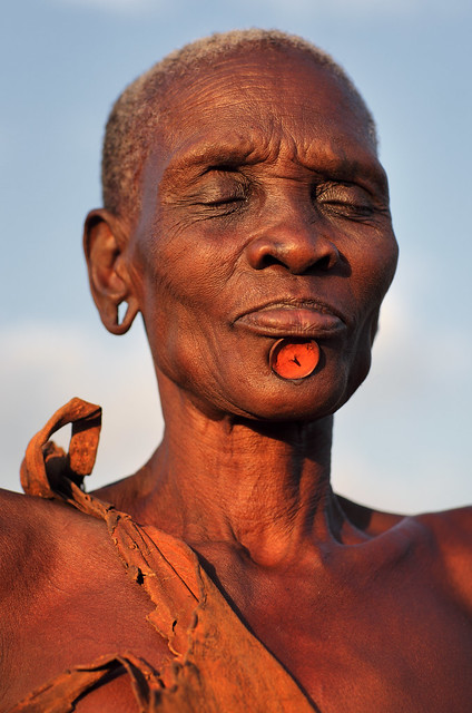 Ethiopia tribes Bodi tribe Old Bodi woman with lip plate in the village 