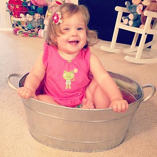 Babe in a bucket.