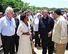 Cuban Minister of Tourism Manuel Marrero, center, attends a fair during 2012. Travel to the revolutionary Caribbean island-nation has increased in the recent period. by Pan-African News Wire File Photos