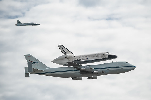 Space Shuttle Discovery Flies Over DC