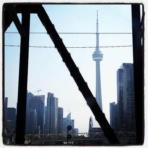 Seen through a footbridge, our friend the CN Tower. #yyz #toronto