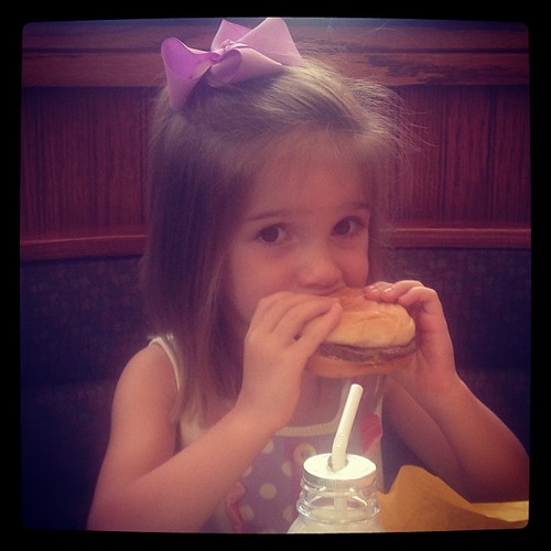 her 1st fast food burger. that she's actually eating. 