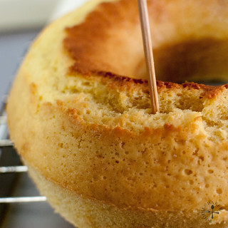 unmould the cake and poke holes all over with a skewer