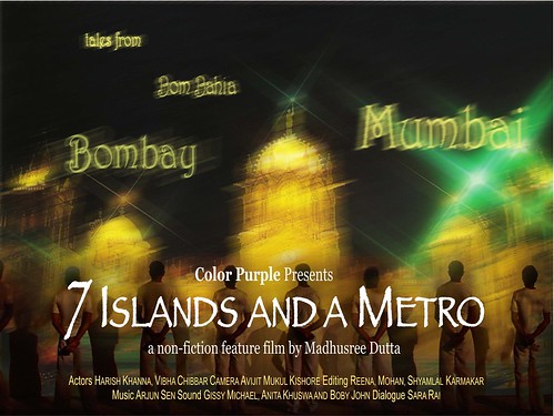 poster for the movie seven islands and a metro, which shows a lit-up building with people standing in front of it