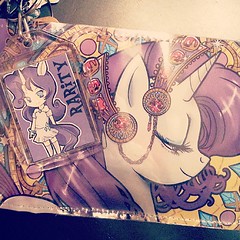 The best-ever booth partner in the world @chinochinako got me #Rarity goodies at #BronyFanFair! What a sweetie! I also got the same design of the wallet as a t-shirt... #obsessed