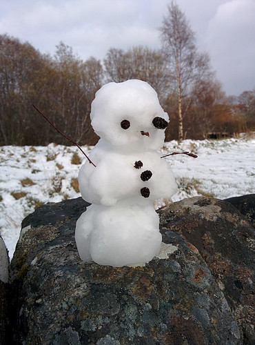 mini snowman (after a brief snowball fight)
