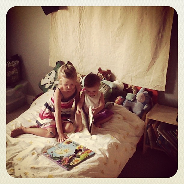 Sisters reading