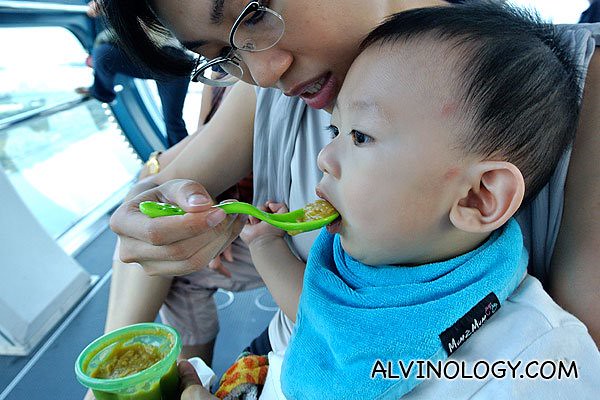 Asher behaving like a boss - enjoying his meal while riding the Singapore Flyer
