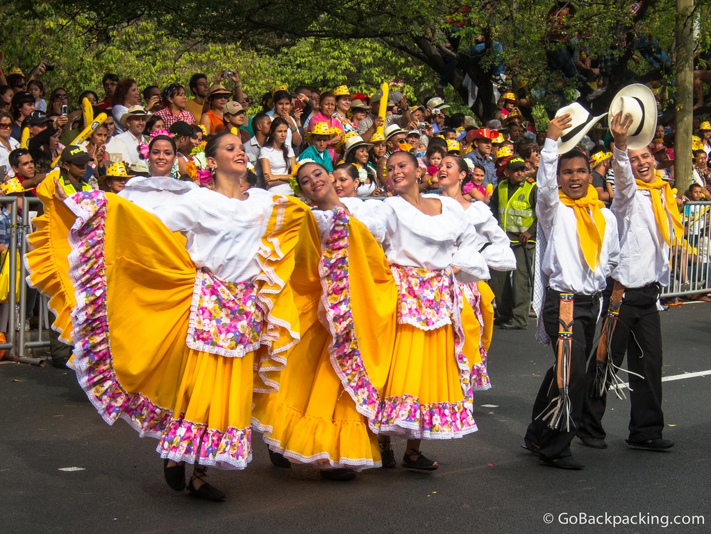 Between the various groupings of silleteros were colorfully-dressed dancers 