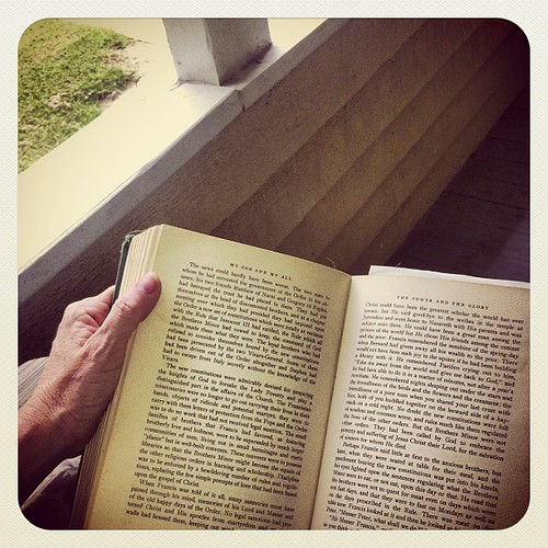 Reading about St. Francis of Assisi on my mom's porch swing.