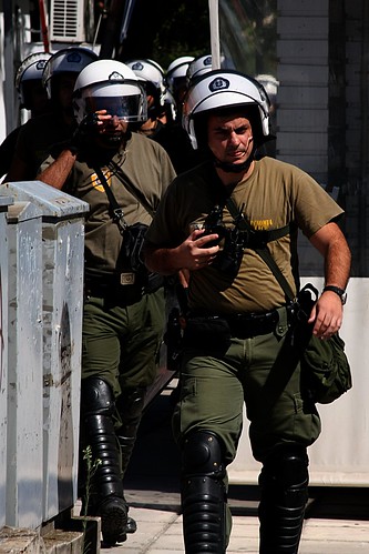 Greek riot police take up positions to protect Golden Dawn offices against anti-fascist protesters by Teacher Dude's BBQ