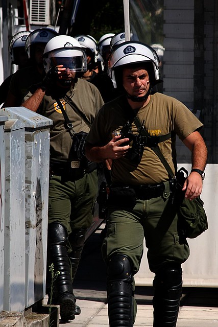 Greek riot police take up positions to protect Golden Dawn offices against anti-fascist protesters