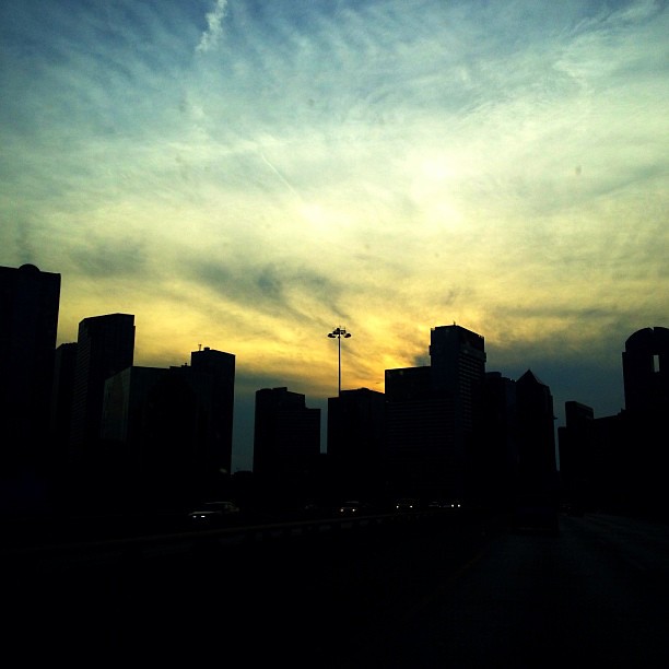 Sun setting on the Dallas skyline.