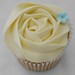 Simple vanilla cupcake with blue blossom