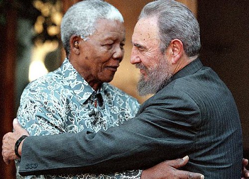 File photo of Cuba's President Fidel Castro and former South Africa's President Mandela in Johannesburg