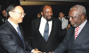 Mines and Mining Development Minister Obert Mpofu exchange MoU documents with Chinese Deputy Minister of Commerce Mr Li Jinzao, while Vice President Joice Mujuru looks on in Harare on May 22, 2013. by Pan-African News Wire File Photos