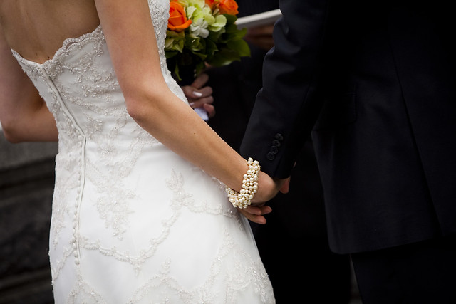 KateRussWedding_holding hands_phot by Augie Chang