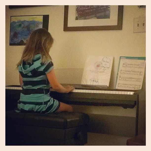 Working on memorizing her recital pieces!