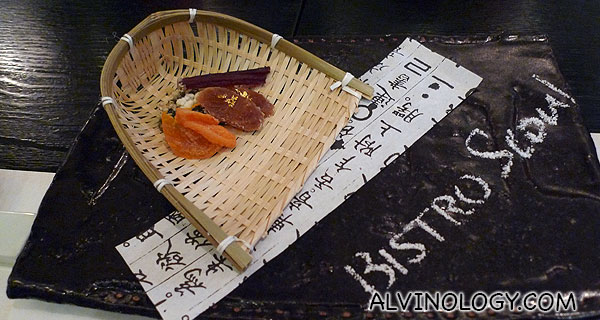 Appertiser consisting of assorted dried food, including dried ginseng with gold flakes
