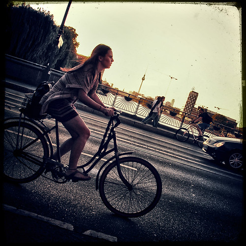 girl on bike by andrè t.