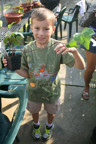 Nathan-holding-a-plant