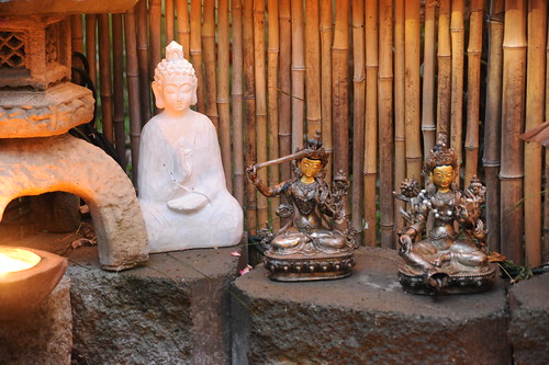 Statues of Lord Buddha, Manjushri, Lady Tara, enlightened entities, Japanese lantern, Citronella candle, bamboo fence, A Garden for the Buddha, Seattle, Washington, USA by Wonderlane