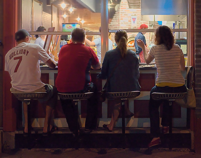 Soulard Neighborhood, in Saint Louis, Missouri, USA - diners at outdoor counter
