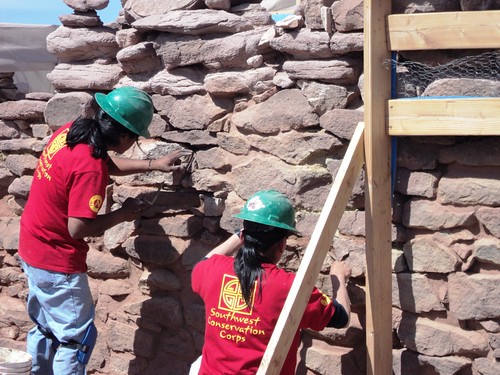Southwest Conservation Corps’ Ancestral Lands Preservation Crew corps members work on an historic structure at Petrified Forest National Park in Arizona. The Preservation crew program engages advanced crews of Native American young people to work in small crews completing technical preservation projects at historic and pre-historic sites, primarily in partnership with the National Park Service.  Project locations have included Arches NP, El Morro NM, El Malpais NM and Petrified Forest NP, and Glen Canyon.  The Corps Network awarded the Tribal Preservation Program its 2010 Project of the Year Award for partnership with a federal agency.