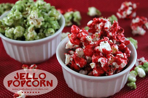 Jello Popcorn in red and green in two white bowls.