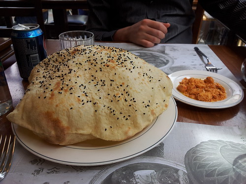 Puffed flat bread served with a roasted red pepper spread at Çiya Kebap