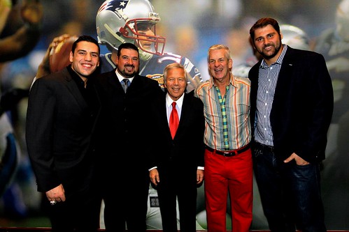 Foxborough, MA - From left Boston Bruins forward Milan Lucic, former New England Patriot Joe Andruzzi, New England Patriots owner Robert Kraft, actor and comedian Lenny Clarke, and New England Patriots offensive lineman Sebastian Volmer pose for a photo a