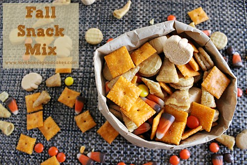 Fall Snack Mix in bag with pieces scattered all around.