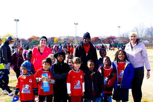 FNS Team members Kristin Caulley and Ileana Alamo (left to right) pose with one of the youth soccer leagues.