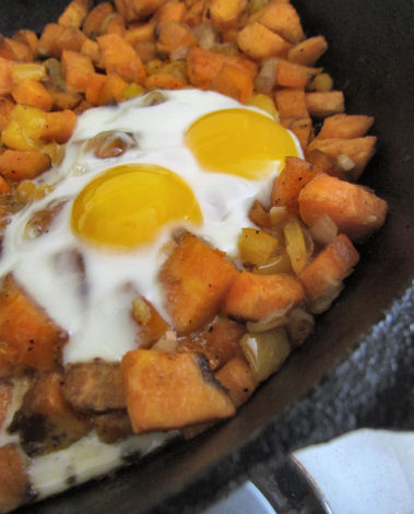 Eggs over sweet potato hash