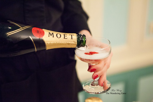 Having a rose and strawberry Moët Champagne cocktail