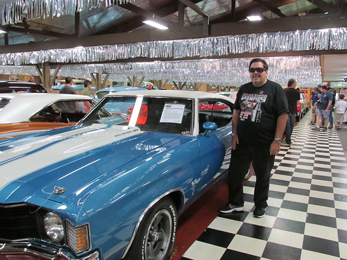 Eddie K posing by a classic American muscle car.  The Volo Auto Museum.  Volo  Illinois.  June 2013. by Eddie from Chicago
