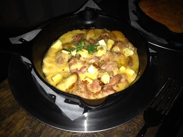 A Colombian version of Canada's poutine, including chicharron, potatoes, cheese and gravy