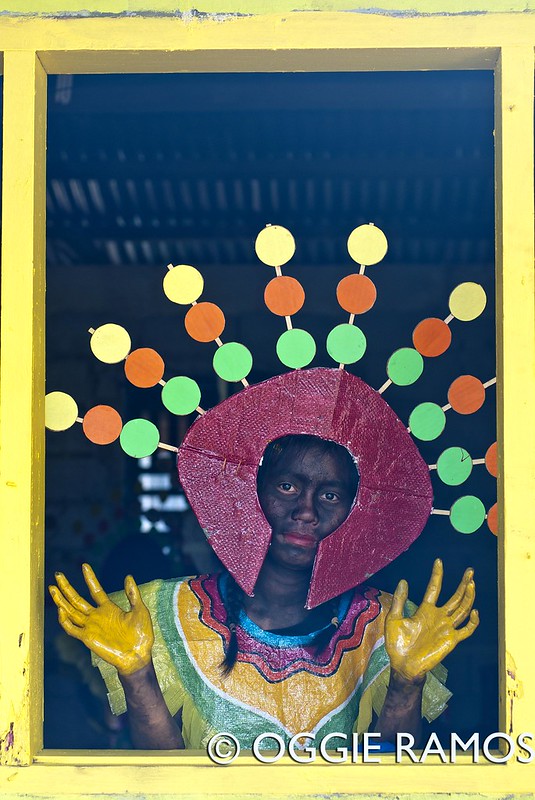 El Nido Barutuan Festival Taberna Girl in Costume by the Window