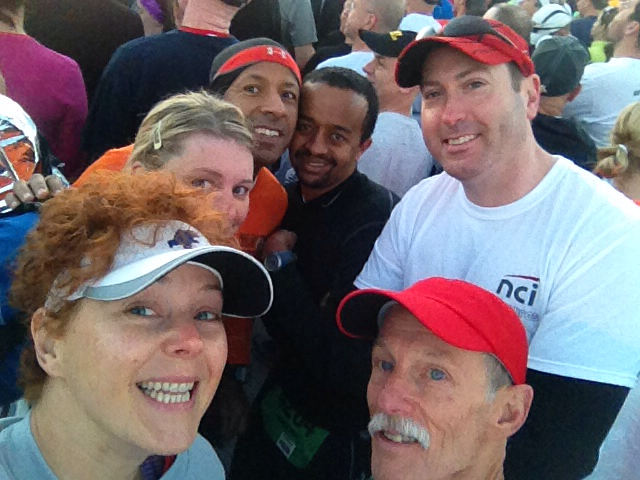 Huddling in the chilly breeze at the Army 10 Miler start