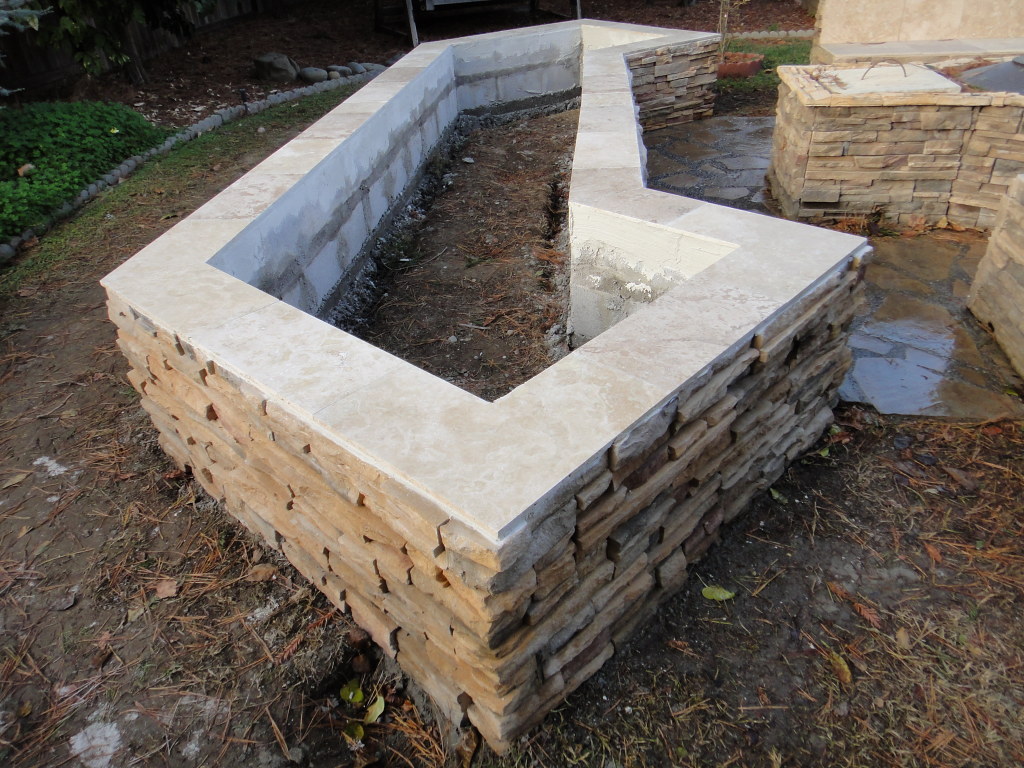 Cultured Stone Planter Box With Travertine Tile Cap In Davis