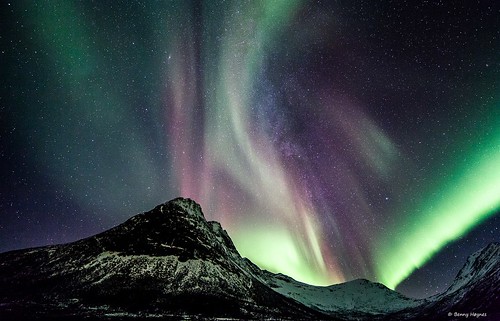 Dec 12 2012 Some aurora outburst over hills, the milkyway in middle of aurora, from Godfjord, Sortland, Norway