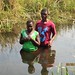 Harry Jikata baptizing a woman at Ndati